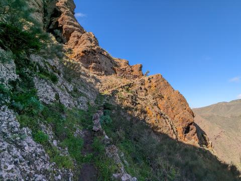 The trail's narrow paths and rock-hewn stairways